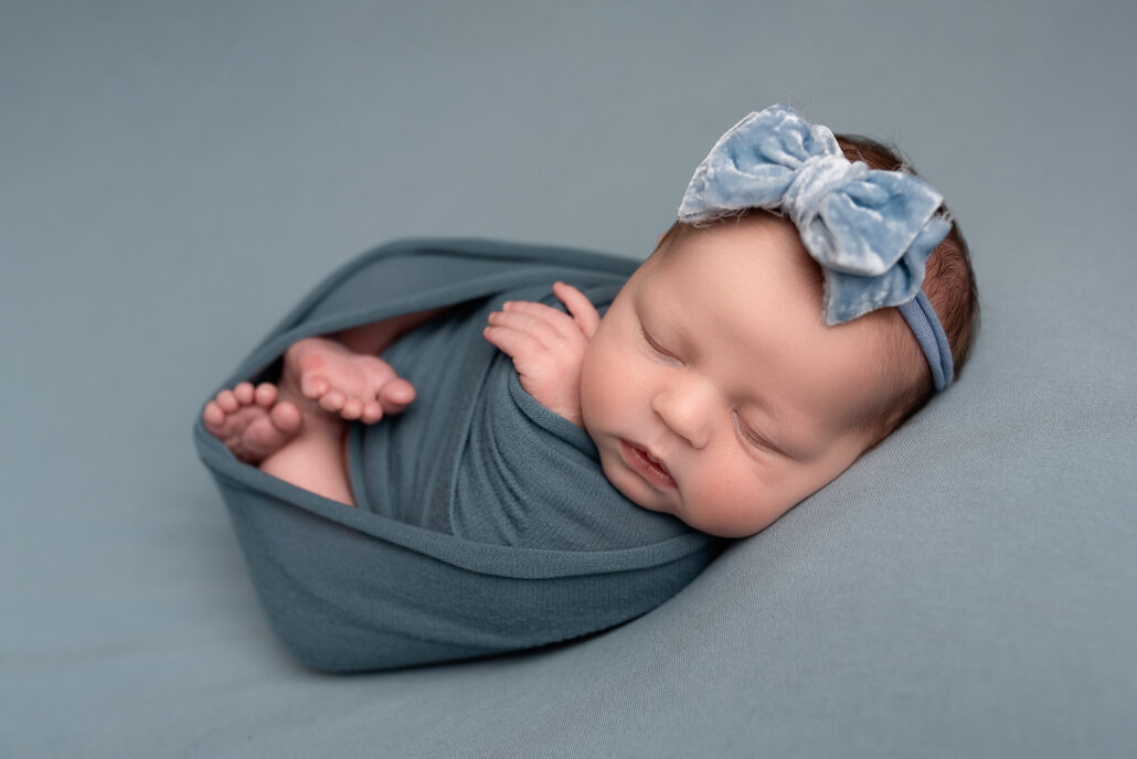 Baby wrapped up with Aberdeenshire Newborn Photographer sharon nicholson photography